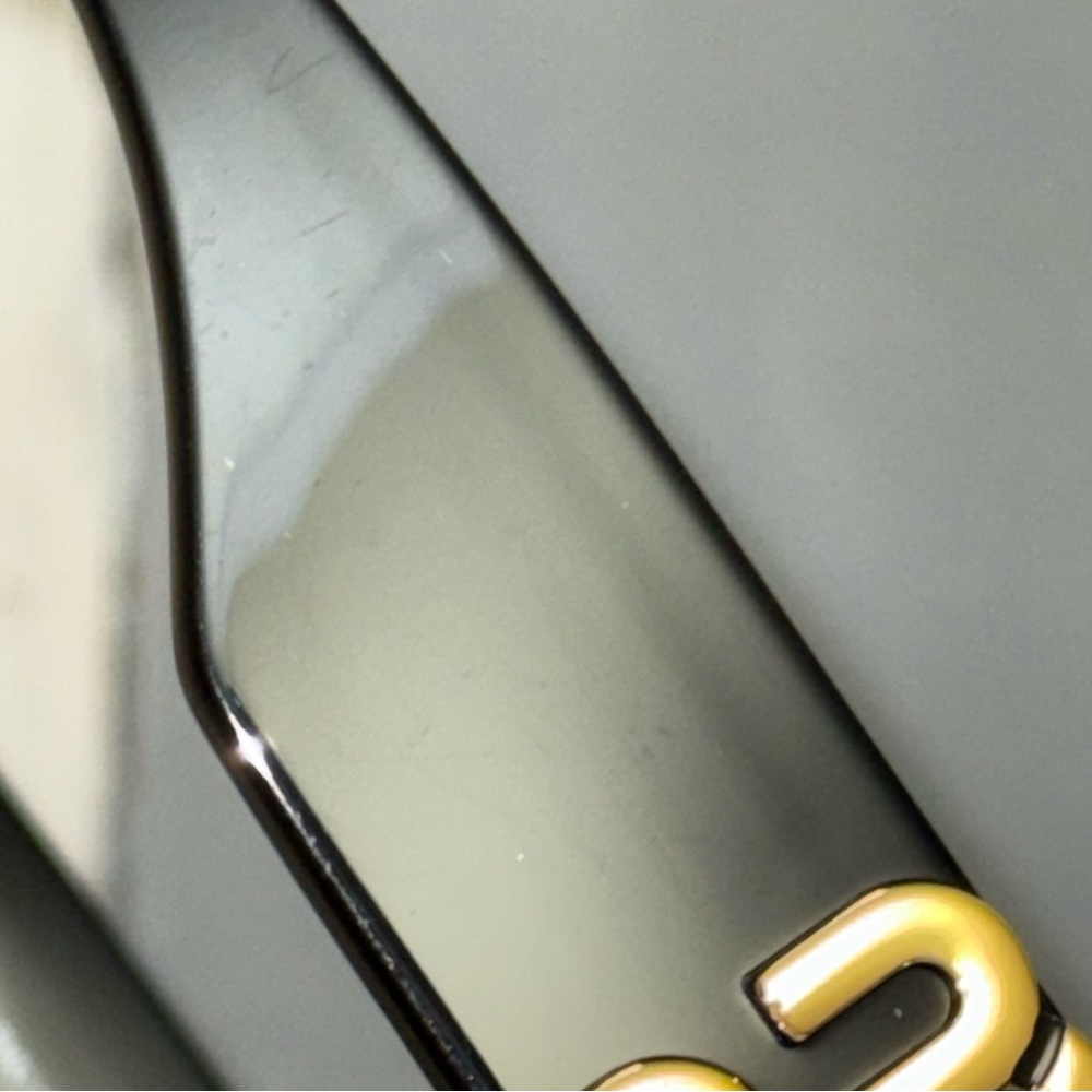 Miu Miu Black Oval Sunglasses with Gold Logo Temples - Picture 10 of 14